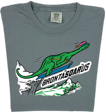 Load image into Gallery viewer, Skiing Bronta SOAR us &quot;garment dyed&quot; Brontosaurus Dino T-shirt